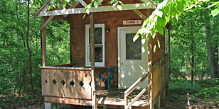 rustic cabin at pinch pond family campground